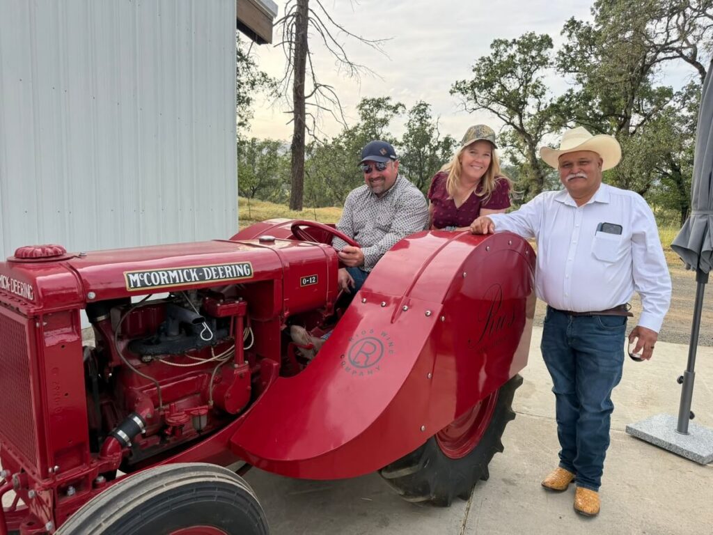 people smiling on tractor
