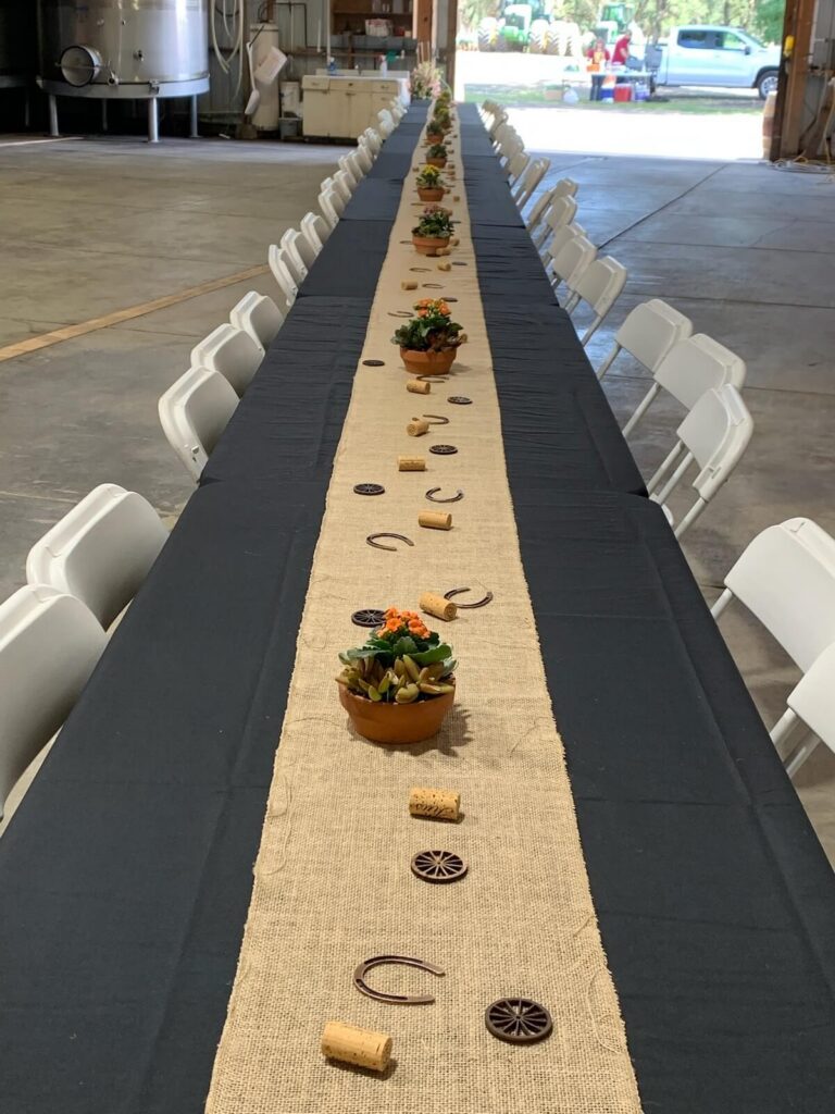 long table with setting for event